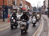 Some of the 70 scooters that rode through Sleaford on Saturday. EMN-210920-132954001