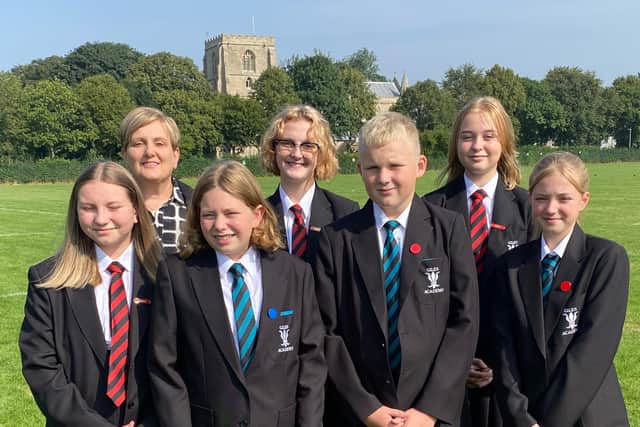 Pictured (from left, back) are: Lucy Conley, Meagan Chennells, Zuzanna Przybylska, (front), Natalia Prucnal, Cassidy Barton, Thomas Goreliks, and Brooke Woods.