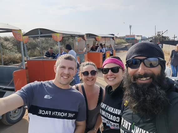 Christian, Kate and Jet making friends along the promenade heading for  Skegness.