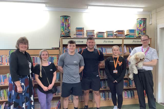Jack Johnson, of Phoenix Fitness, has donated a range of books for pupils at the Richmond School in Skegness to learn about internet safety and cyber bullying.