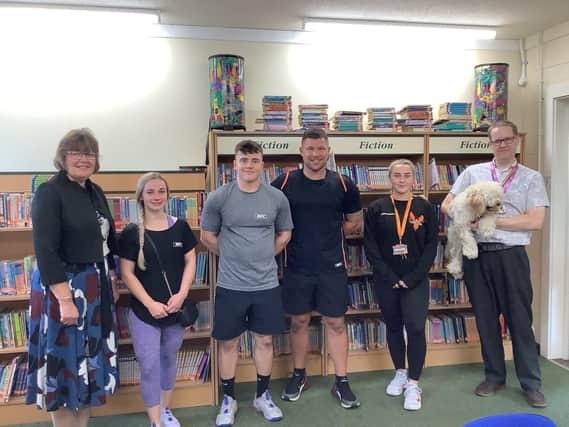 Jack Johnson, of Phoenix Fitness, has donated a range of books for pupils at the Richmond School in Skegness to learn about internet safety and cyber bullying.