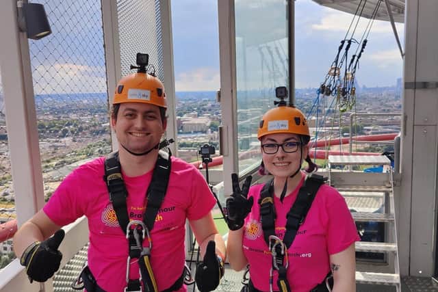 Joshua Cullen and sister Maria Cullen prepare to abseil the 114.5m structure in London.