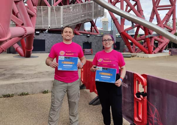 Joshua and Maria after completing the abseil in London.
