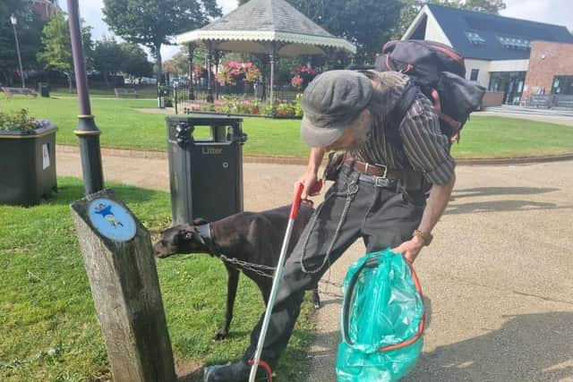 Paul litter  picking in Tower Gardens in Skegness.