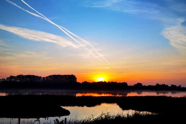 Chris, Kate and Jet enjoyed the Lincolnshire sunset when they camped near Boston.