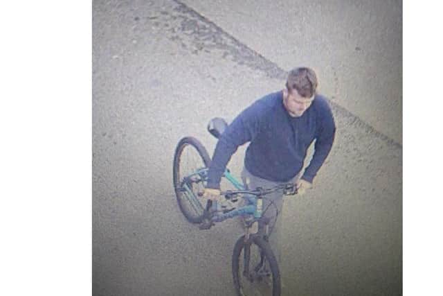 The CCTV image of the man police want to speak to.
