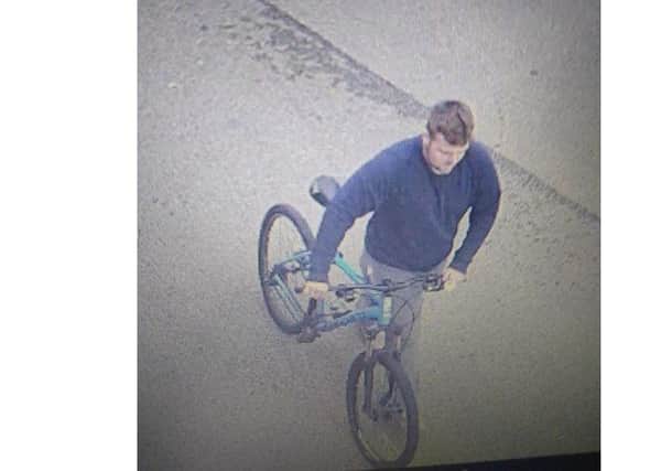 The CCTV image of the man police want to speak to.