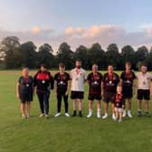 Horncastle Cricket Club members back at the club house after their 26 mile walk.