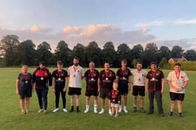 Horncastle Cricket Club members back at the club house after their 26 mile walk.