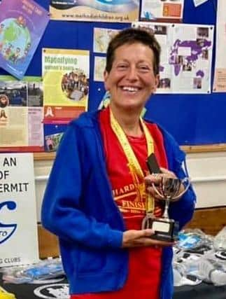 Moira with her F50 trophy. Photo Mike Wells