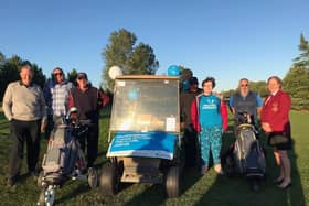 Coming off the last 18th - Matt Tunaley and all his golf buddies and Carole Fewings, Club Captain at South Kyme. EMN-210929-165740001