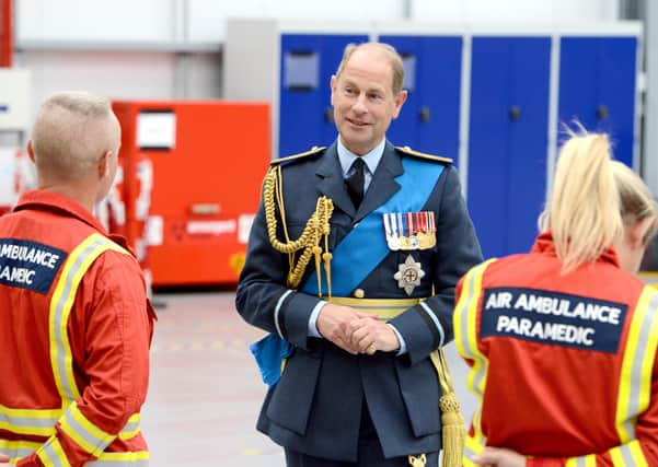 HRH The Earl of Wessex meets the air ambulance paramedics. EMN-210930-093057001