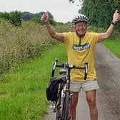 The Rev David Post celebrating reaching his target distance EMN-210930-162206001