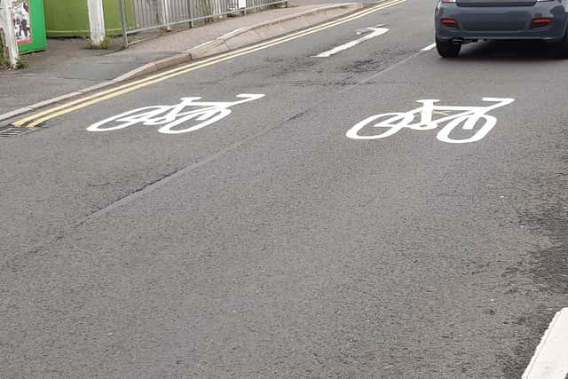 Double cycle signs on Carre Street approaching Boston Road. EMN-210930-170735001