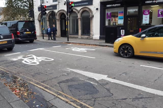Cycle signs in the Market Place. EMN-210930-170746001