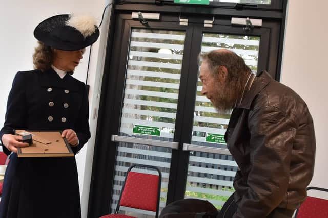 Paul Russell receives his award from the High Sherriff of Lincolnshire Claire Birch. Photo: Barry Robinson.