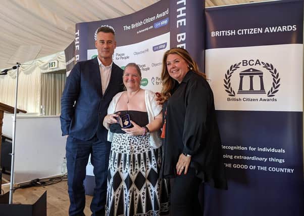 Lianne receiving her award