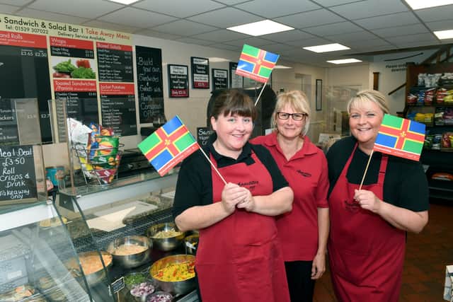 Appetites and their Lincolnshire flags. L-R Tasha Ford, Angie Lloyd, Sarah Graves EMN-210410-101053001