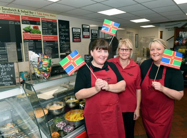 Appetites and their Lincolnshire flags. L-R Tasha Ford, Angie Lloyd, Sarah Graves EMN-210410-101053001
