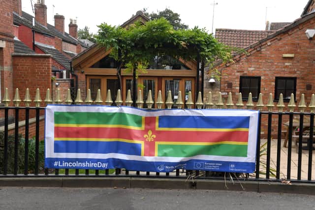 One of the Lincolnshire Day banners on Carre Street. EMN-210410-101156001