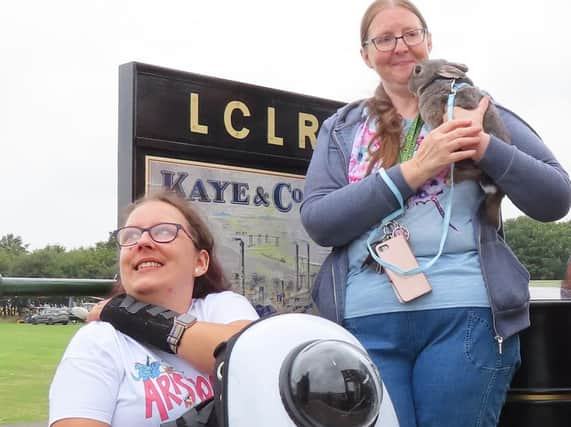 Sweep, the railway-loving rabbit with his owners, waits for his LCLR
train ride (Photo: John Raby/LCLR).