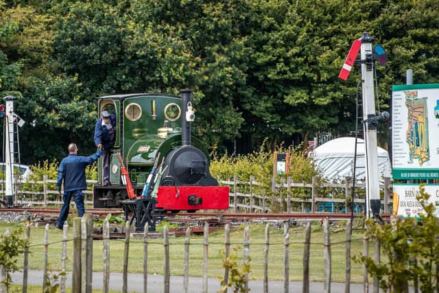Jurassic’s driver collects the token to access the main line and take over
a midweek service – an experiment which proved very popular. (Photo D. Enefer/LCLR).
