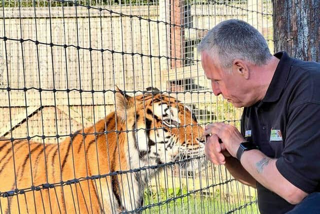 Steve Nichols, CEO of the Lincolnshire Wildlife Park, with Princess.