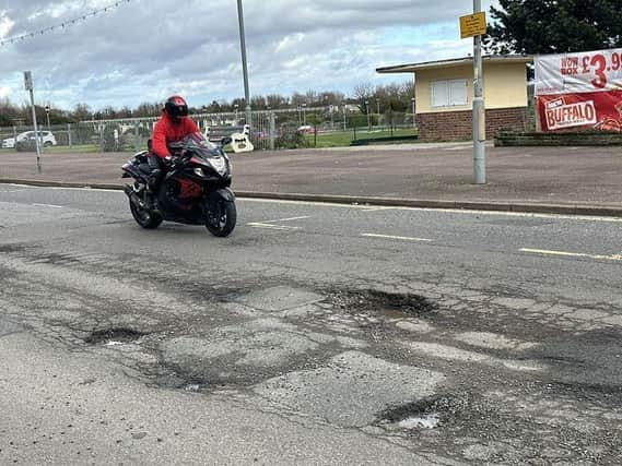 Potholes along the seafront are so deep they could kill, warns a former motorcyclist.