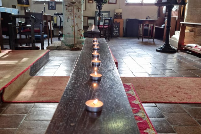 Candles were lit in memory of those who died in Ingoldmells at a memorial service at St Peter and St Paul's Church.