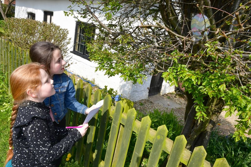 Found one! Ellie-May Thompson, 9,  and Lacey Fitzpatrick, 11,  of Skegness, discover an egg i a tree.