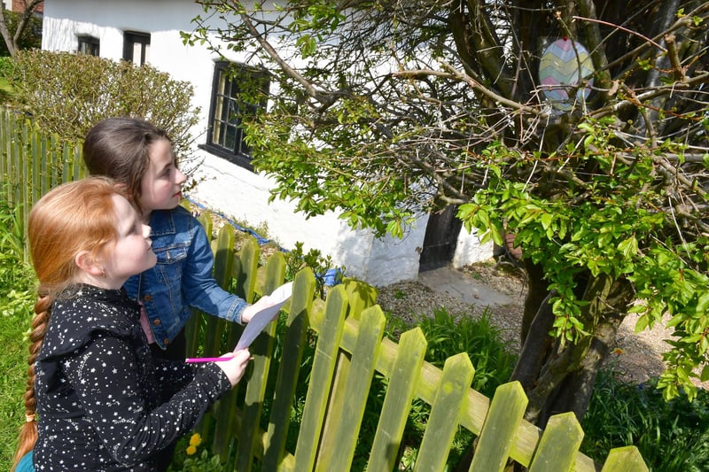 Found one! Ellie-May Thompson, 9, and Lacey Fitzpatrick, 11, of Skegness, discover an egg i a tree.