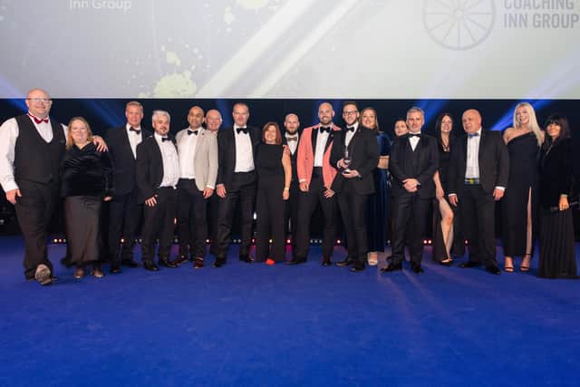 Senior staff from across the Coaching Inn Group with host Claudia Winkleman (right) at the Publican Awards 2025.