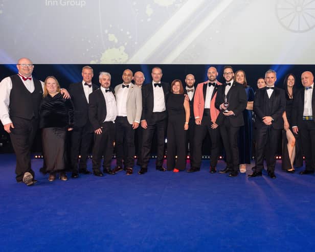 Senior staff from across the Coaching Inn Group with host Claudia Winkleman (right) at the Publican Awards 2025.