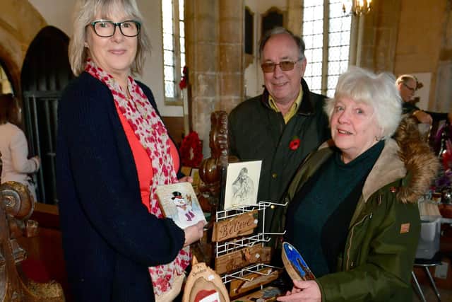 From left - Jacqueline Abel of Abel Woodcraft, with Robert Turner and Geraldine Thompson of Silk Willoughby at the Crafts By Candlelight fair.