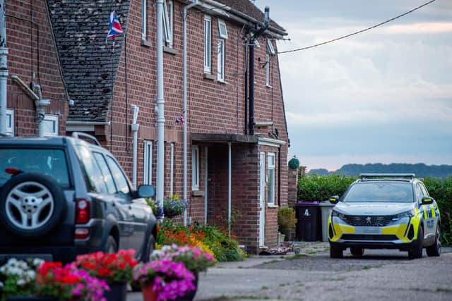 Police at the murder scene in Kirk Close, West Ashby.