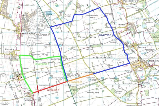 A map marking the road closure on the B1202 and the two diversion routes.