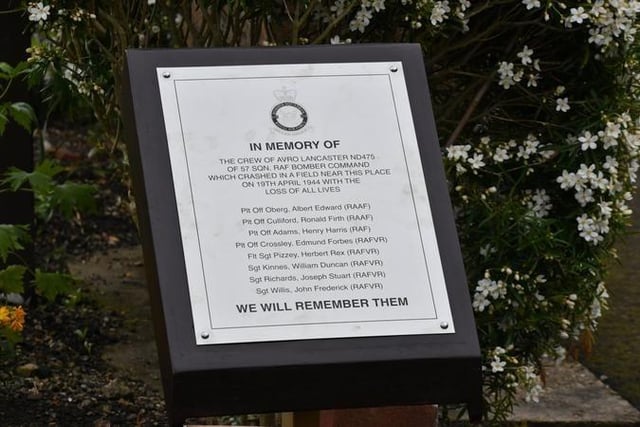 The plaque honours the eight members of the crew who lost their lives in the crash