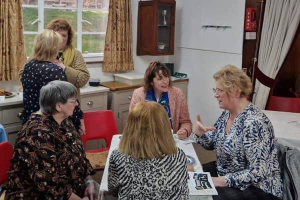Victoria Atkins MP chats with members of Binbrook & District WI, who are an integral part of the volunteers in big-hearted Binbrook