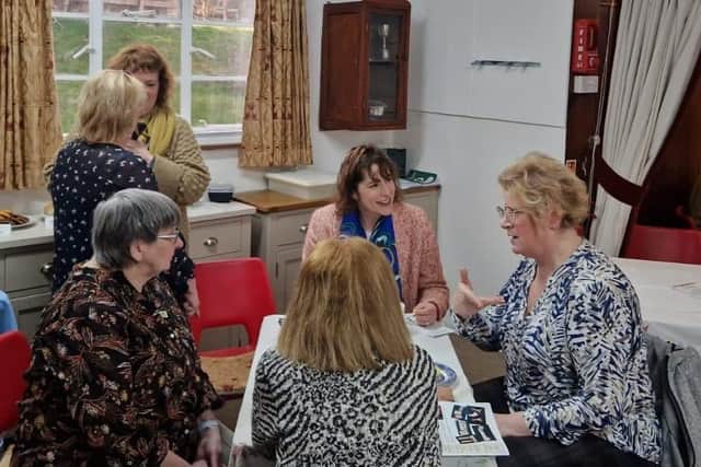 Victoria Atkins MP chats with members of Binbrook & District WI, who are an integral part of the volunteers in big-hearted Binbrook