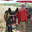 John Nuttall with his donkeys on Skegness beach.