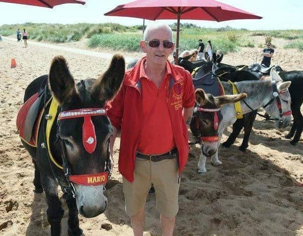John Nuttall with his donkeys on Skegness beach.
