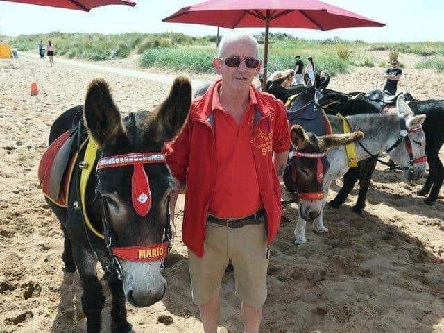 John Nuttall with his donkeys on Skegness beach.
