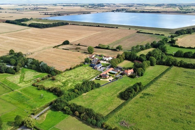 The property, its grounds, and the surrounding countryside.