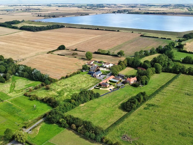 The property, its grounds, and the surrounding countryside.