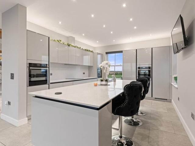 The kitchen section of the open-plan kitchen, dining room, lounge.