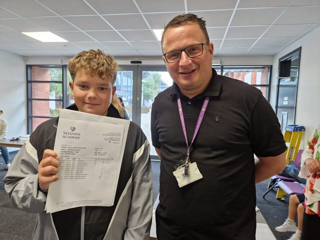 Principal Claudio Gissendorf with Alex Rogers who gained a  Distinction 2  and Merit 2 in drama and dance and aims to be a dance teacher.