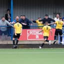 Trinity celebrate Saturday's late winner with their fans.