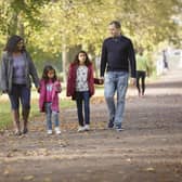 Families enjoying an autumn walk. Photo: National Trust Images/Arnhel de Serra