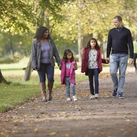 Families enjoying an autumn walk. Photo: National Trust Images/Arnhel de Serra