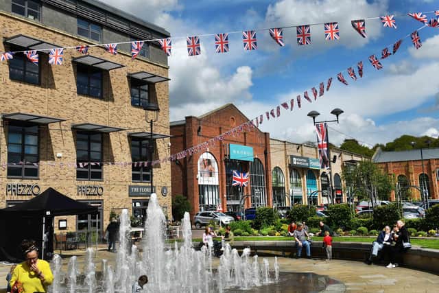 The Union Jack bunting was hung and the flags were flying across the shopping centre